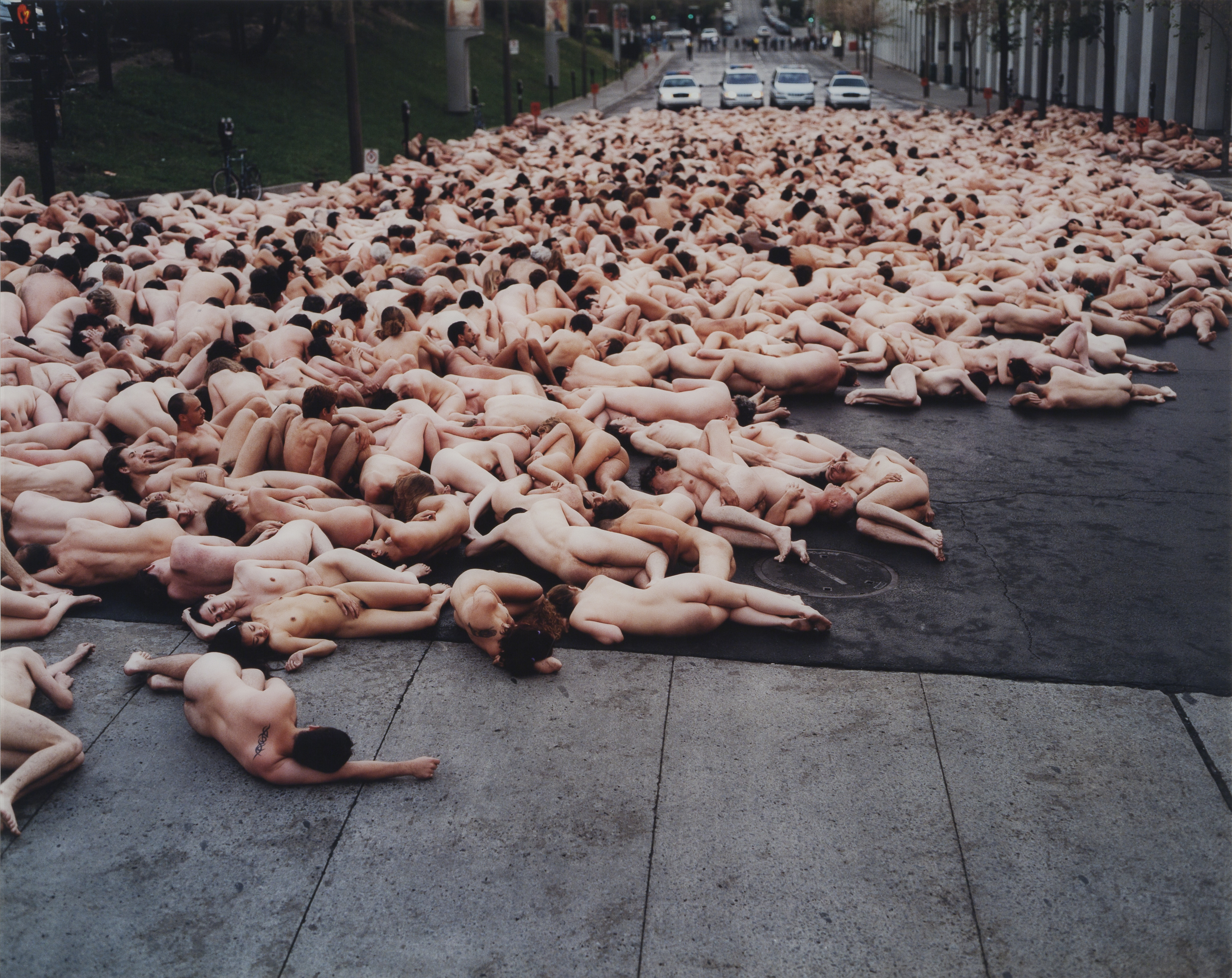 Photograph of naked people.