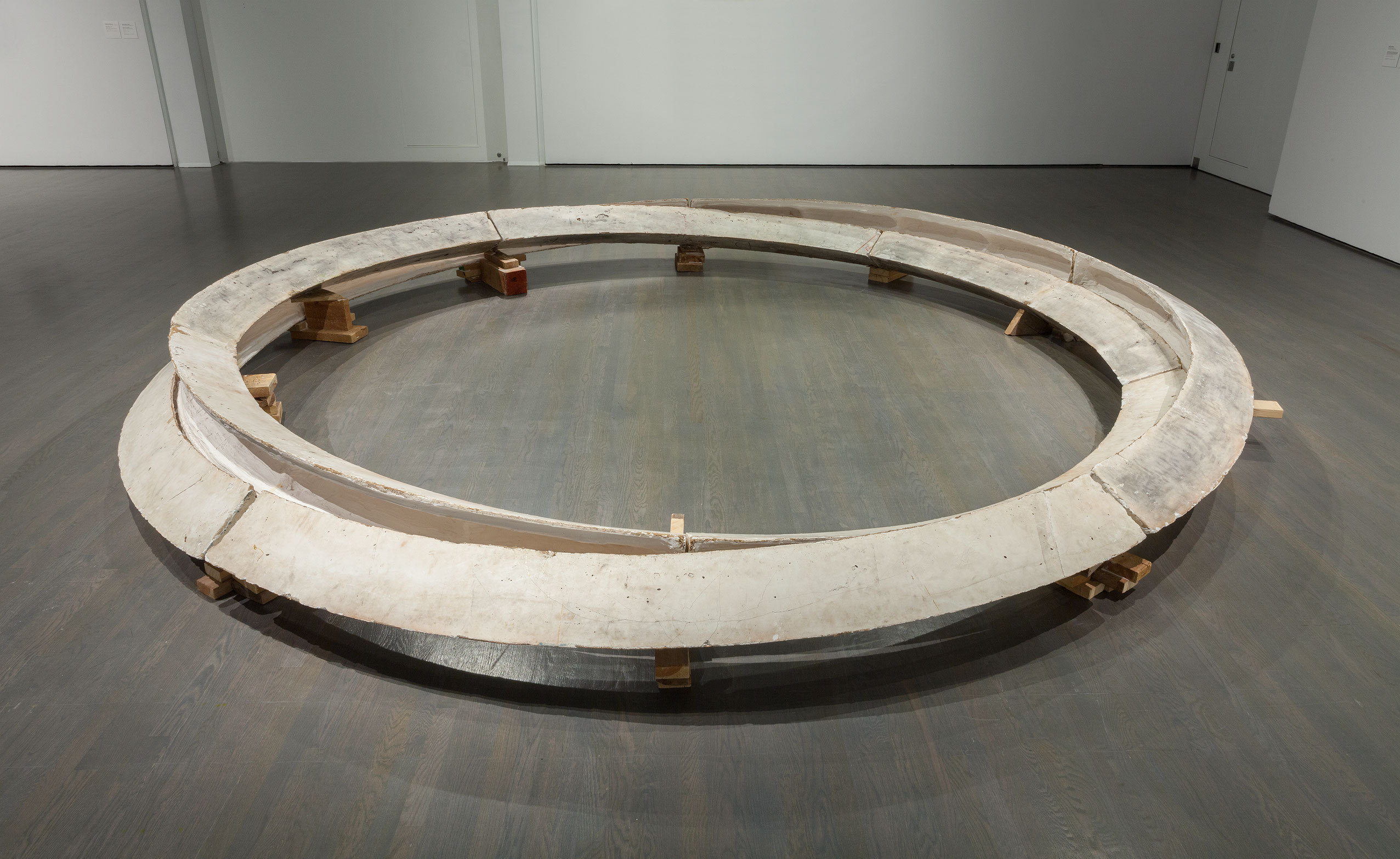 Smoke Rings: Two Concentric Tunnels, Skewed and Noncommunicating, 1980, Plaster and wood.