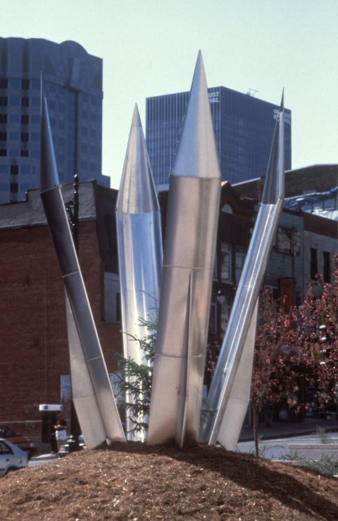 Growing Protectors, 1991-1992, Stainless steel, white spruce, coniferous needles, earth.